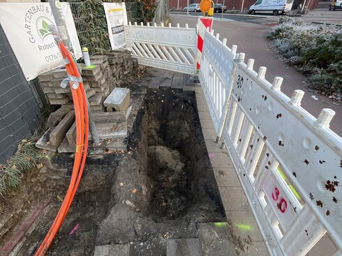 Construction site where a fiber optic cable is being laid