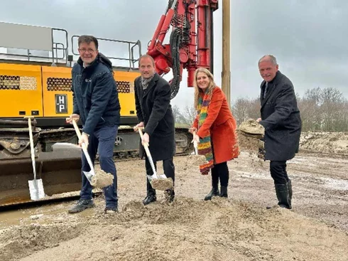 The four participants during the groundbreaking ceremony on the construction site