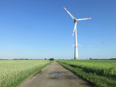 Several wind turbines on a field